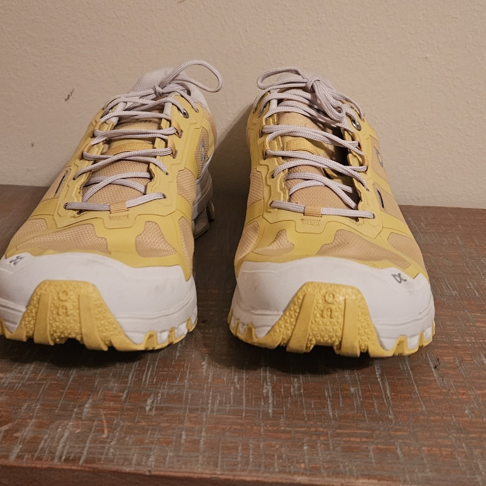 On Running Yellow and White Sneakers with Retro Design